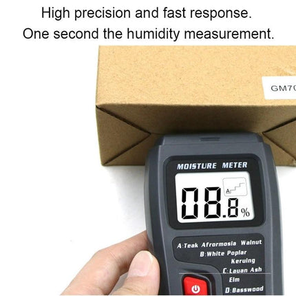 Rechargeable Wood Moisture Tester for Flooring and Carton handheld moisture meter showing 08.8% reading next to cardboard box