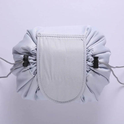Travel Waterproof Drawstring Cosmetic Bag For Toiletries in light gray polyester waterproof fabric with drawstring closure and compact gathered design