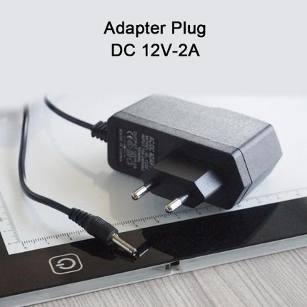 Portable A2 Acrylic Light Board for Sketching and Drawing with DC 12V-2A adapter plug on acrylic surface