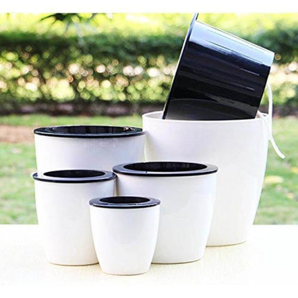 Lazy Flower Pots Self Watering Planter, 11cm Diameter white and black double-layer PP resin pot displayed with multiple sizes for indoor and outdoor use