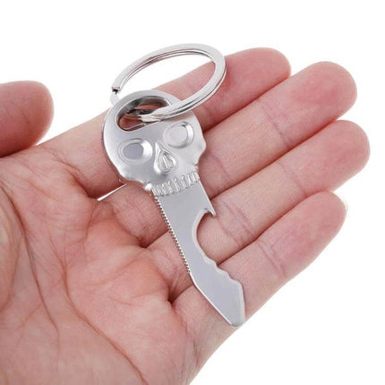 Skull Shaped Multi-Function Bottle Opener Key Chain Accessory – zinc alloy skull keyring bottle opener in hand, compact everyday keychain tool