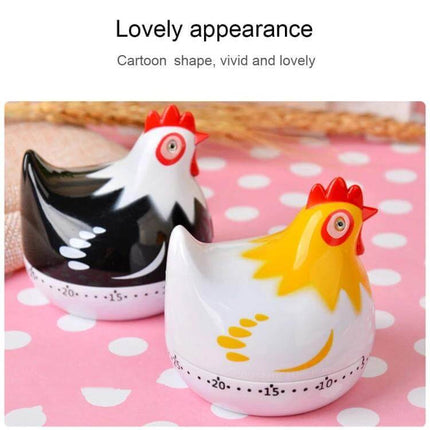 Chicken Shape 60-Minute Mechanical Kitchen Timer For Everyday Cooking - yellow and black cartoon chicken kitchen timers on pink polka dot surface