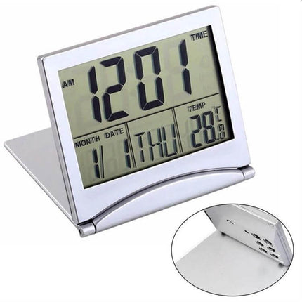 Portable Folding LCD Travel Alarm Clock With Temperature Display – compact silver folding alarm clock showing time, date and temperature on large LCD
