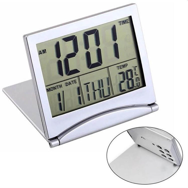 Portable Folding LCD Travel Alarm Clock With Temperature Display – compact silver folding alarm clock showing time, date and temperature on large LCD
