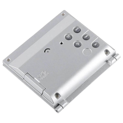 Portable Folding LCD Travel Alarm Clock With Temperature Display silver compact foldable design showing back panel with buttons and hinge