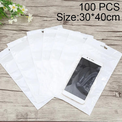 Clear Front White Pearl Zip Lock Bag for Jewelry Storage, 30cm x 40cm — clear-front white-pearl zip lock bag showing phone and multiple bags protecting jewelry and accessories