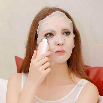 Nanum Facial Hydrating Massager Mini Humidifier For Daily Hydration - woman using portable humidifier massager with sheet mask for on-the-go hydration