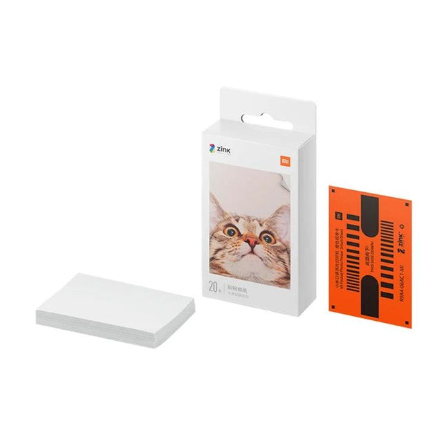 Xiaomi 50-Sheet Adhesive Photographic Paper for Pocket Printers showing pack, blank sheets and sample print