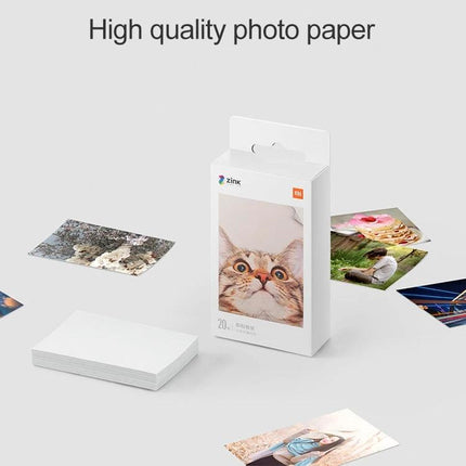 Xiaomi 50-Sheet Adhesive Photographic Paper for Pocket Printers showing pack and printed photos ready to stick