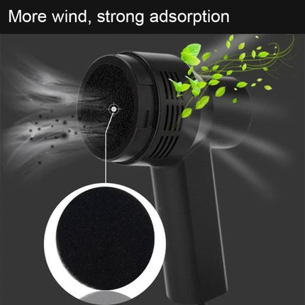 Handheld Portable USB Suction Cleaner for Keyboards and Laptops showing strong suction removing dust from keyboard and laptop crevices