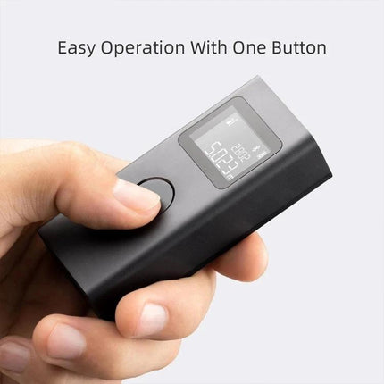 Xiaomi Smart Laser Distance Measurer for Home Projects handheld device showing one-button operation and digital display for room measurements