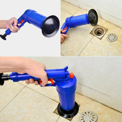 Daily Home Essential for Clearing Kitchen Drain Clogs - blue compressed-air drain plunger being used on a kitchen floor drain to dislodge grease and food buildup