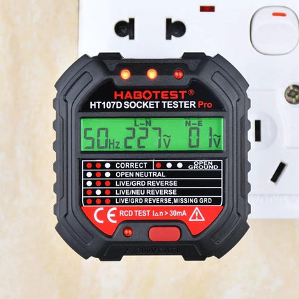 HABOTEST HT107D Digital Socket Tester for Electrical Checks showing 227V LCD reading and indicator lights plugged into wall outlet