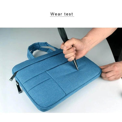 Durable Laptop Sleeve with Handle and Pockets for 15.6 Inch Laptops showing wear test with handle and front pockets protecting a 15.6-inch laptop