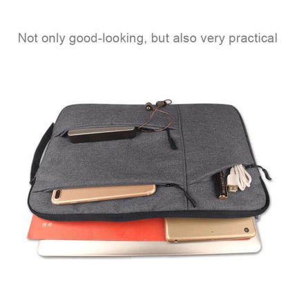 Protective Laptop Sleeve for 15.6-Inch Laptops and Smaller - grey sleeve with pockets, soft lining, and accessories organized for travel