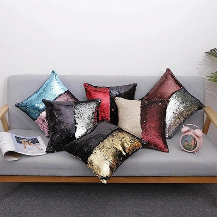 Two Tone Glitter Sequins Pillow Cover, 40x40 CM, Reversible shown in assorted colors on a modern sofa with sequined reversible surface