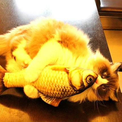 Adorable Simulation Fish Toy for Everyday Cat Play at Home - fluffy cat cuddling and playing with realistic fish toy on table