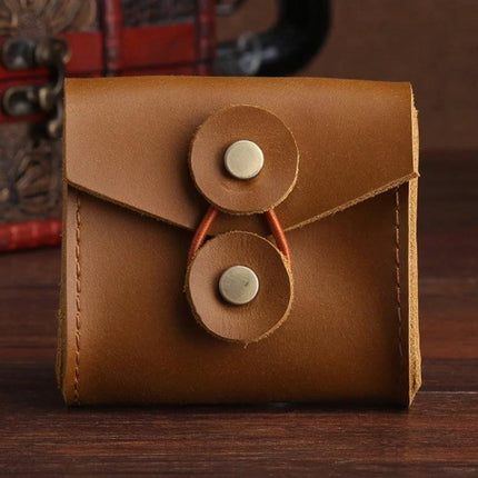 Portable Storage Case for Earphones and Cables on the Go - compact brown leather case protecting earphones and cables