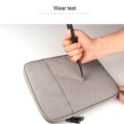 Protective Sleeve for iPad Mini with Accessory Storage Options showing puncture resistance test on gray sleeve