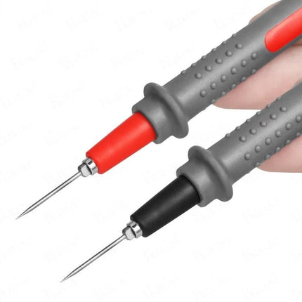 Kaisi Universal Digital Multimeter Probe for Electrical Testing — close-up of red and black sharp steel needle probes with textured gray handles