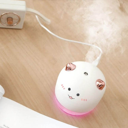 Devil Atomizing Humidifier With Colorful Night Lights compact cute desk humidifier with pink LED base and mist output