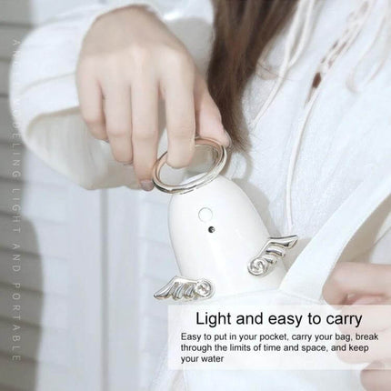 Mini Angel Atomizing Humidifier With Colorful Night Lights compact portable angel-shaped humidifier with 230 mL tank and colorful night light