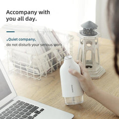 Portable 2.5W Spray Humidifier with Soothing Ambient Light