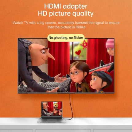Gold-Plated HDMI Female to Male Adapter for Home Theater Connections - gold-plated HDMI adapter between laptop and HDTV showing 1080P HD picture quality