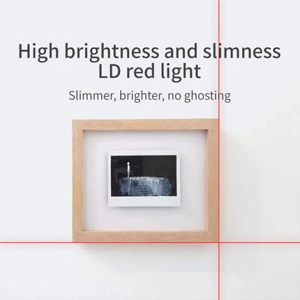 Xiaomi Youpin Dual Laser Goniometer for Angle Measurement showing LD red laser cross aligning a picture frame for precise installation