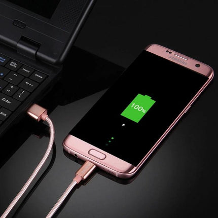 Reliable Cable for Daily Smartphone Charging and Syncing showing a rose gold phone fully charged and connected to laptop via braided USB cable