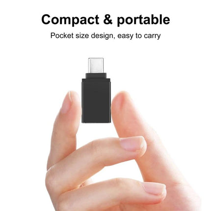 HAWEEL USB-C Adapter for Everyday Device Links at Home - compact portable USB-C to USB-A adapter held between fingers for on-the-go device linking