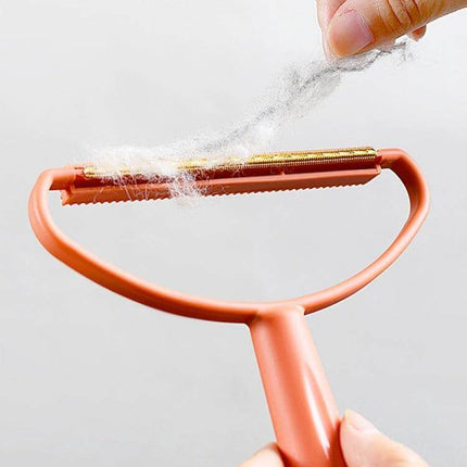 Hair Ball Remover Brush for Woolen Coats and Sweaters showing two-sided 10cm head removing lint and hair from wool sweater for quick touch-ups