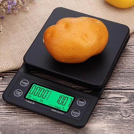 Hand Punch Coffee Scales With Timer For Precise Kitchen Weighing - compact black ABS scale showing 100g weight and timer with a potato on top