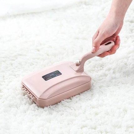 Handheld Carpet Brush Two-Row Design For Pet Hair And Debris on white shag carpet removing pet hair and lint with ergonomic handle