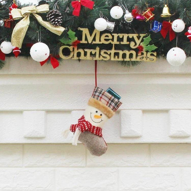 Hang Ornament Christmas Stockings Gift Bags For Decorating - hanging snowman stocking ornament under Merry Christmas garland for mantel decor
