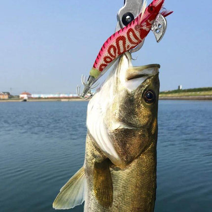 Hengjia 8 Cm Plastic Squid Lures For Casual Fishing - 8cm pink lifelike squid lure hooked in fish at pier, ideal for spinning rod and light tackle