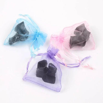 High Heel Protectors PVC Anti Slip Covers For Shoes Size M - three black PVC heel protectors in blue pink purple organza pouches