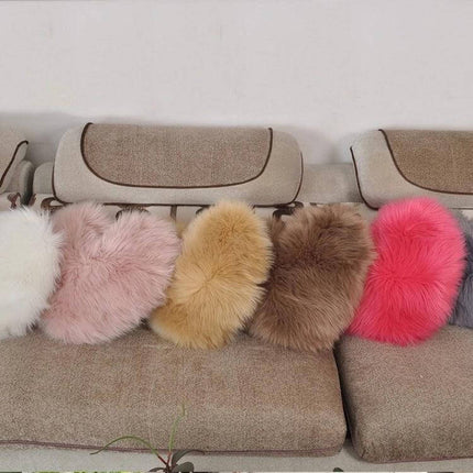 Home Cushion Pillow 40x50 Cm For Sofa And Bed Use plush round faux fur cushions in assorted colors on beige sofa