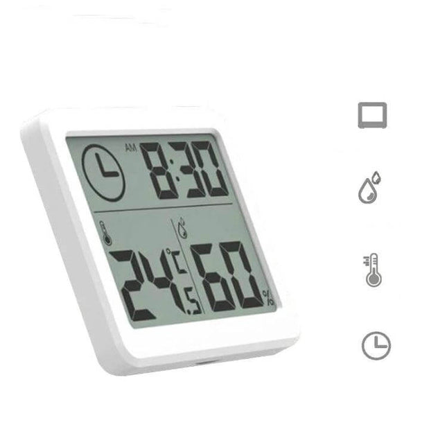 Home Humidity And Temperature Monitor Clock With 3.2-Inch LCD showing time 8:30 and readings 24°C and 60% humidity on white desk display