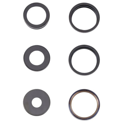 Protective Lens Cover for iPhone 14 Pro Daily Use - six replacement camera lens rings laid out on white background