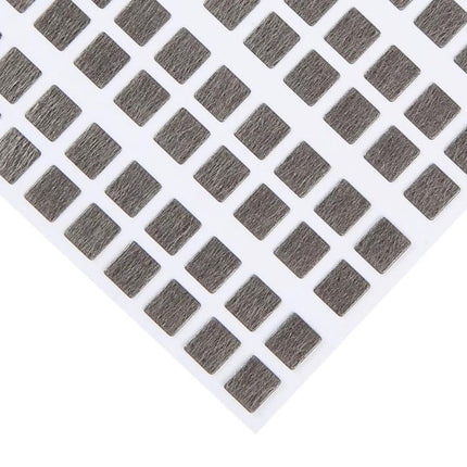 Essential Screen Welding Stickers for iPhone 14 Daily Repairs - close-up sheet of square adhesive welding pads for LCD screen replacement