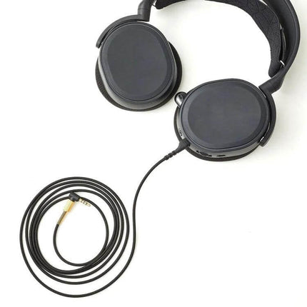 Compatible Black Audio Cable for SteelSeries Arctis Headsets attached to black over-ear gaming headphones on white background