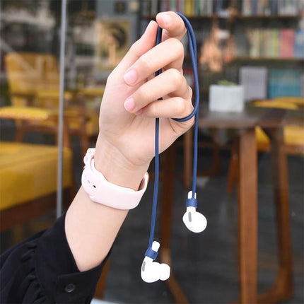 Silicone Protective Set for Everyday AirPods Organization with navy anti-lost hook and white earbuds held by hand
