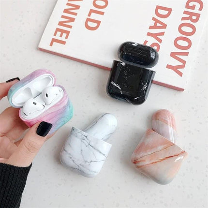 Marble Design Protective Case for Daily AirPods Carry showing three marble-patterned cases (white, black, pink) with AirPods in use