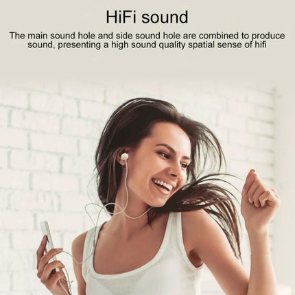 IVON Wired 3.5mm Stereo Earphones For Commuting, Gym And Home woman dancing with wired earbuds and 3.5mm jack