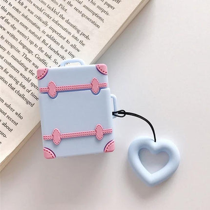 Protective Silicone Case for Daily AirPods Carry in Bright Colors - Light Blue suitcase-style case with pink trim and heart keyring