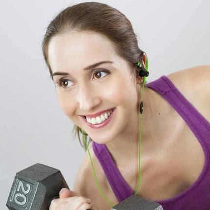 Mucro Wired In Ear Sport Earhook Headphones For Running And Gym Use woman lifting dumbbell wearing green earhooks, sweat-proof fit