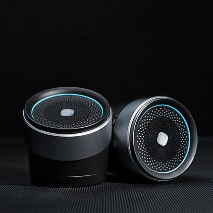 QCY Mini Bluetooth Speaker For Portable Home And Travel compact cylindrical Bluetooth speaker with blue ring lighting