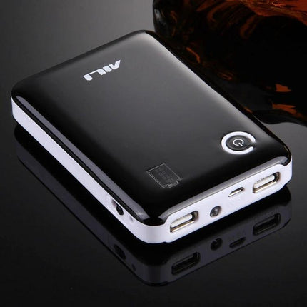 Compact Battery Case for Home and On-the-Go Needs - compact black battery organizer with dual USB ports and power button for travel and home use