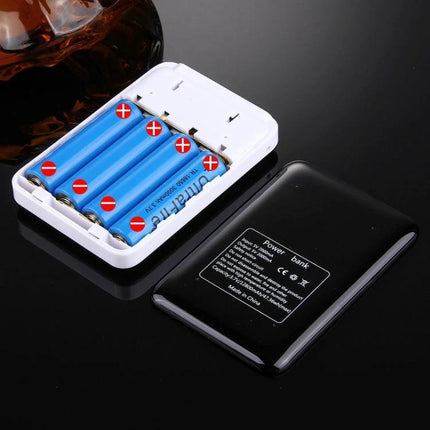 Compact Battery Case for Home and On-the-Go Needs showing organized AA/AAA batteries in a white compact case for travel and home use